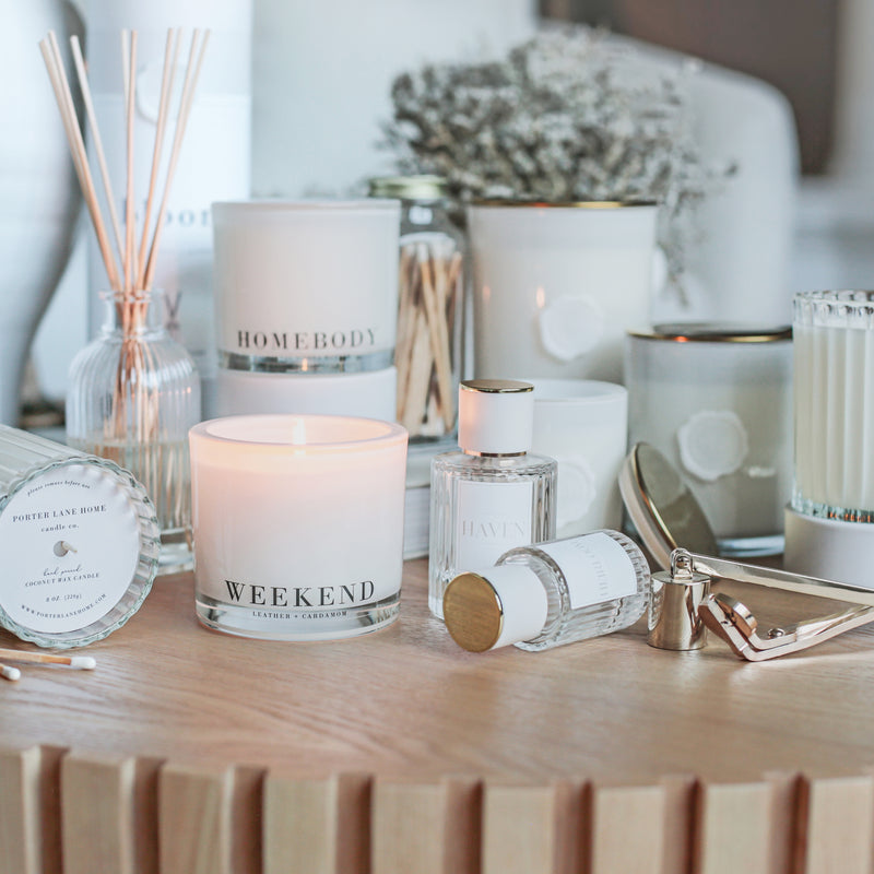 a table topped with candles and other items