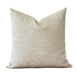 a white pillow on a black background