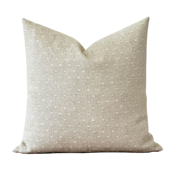 a white pillow on a black background
