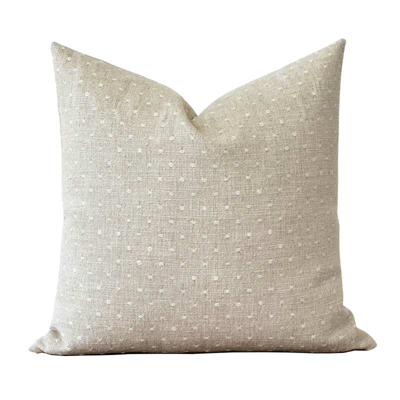 a white pillow on a black background
