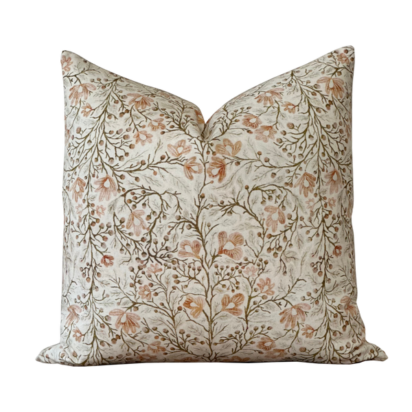a pillow with a floral design on it