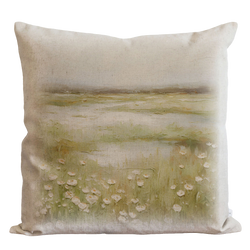 a white pillow with a painting of flowers on it