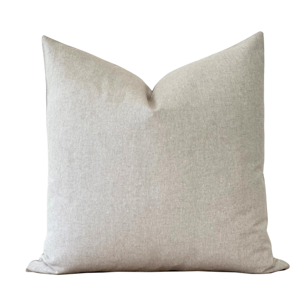 a white pillow on a black background