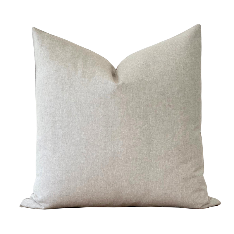 a white pillow on a black background