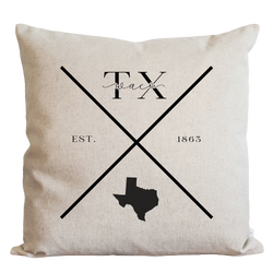 a white pillow with a texas map on it