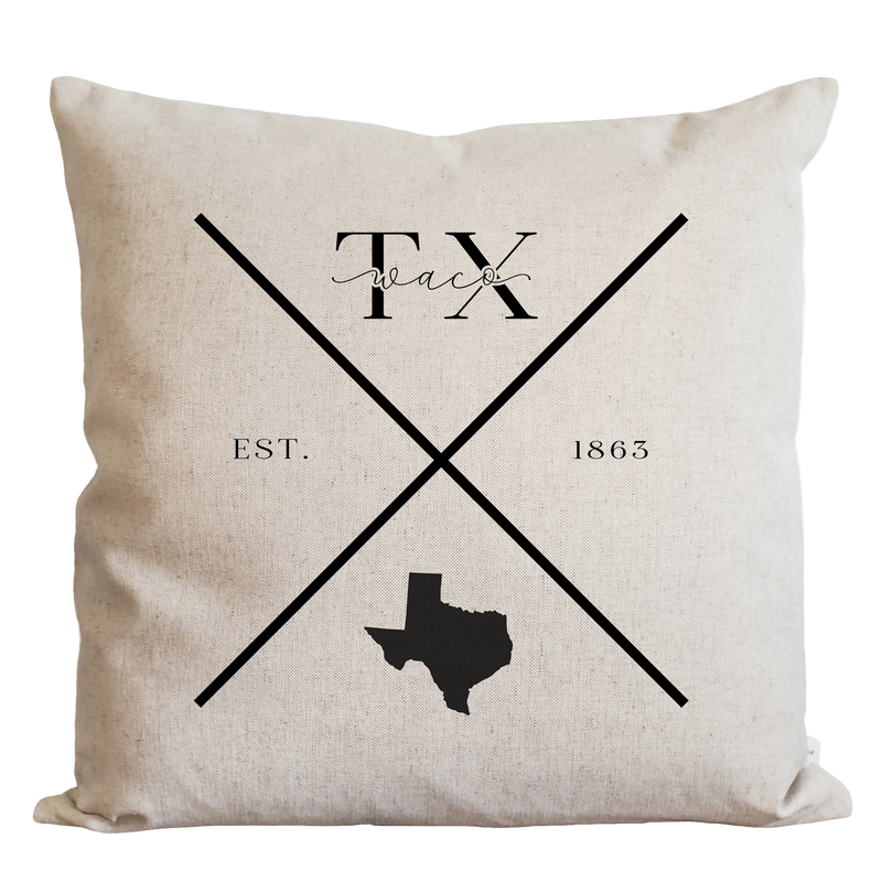 a white pillow with a texas map on it