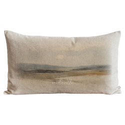 a pillow that has a painting on it