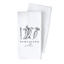 a white dish towel with the words home grown on it
