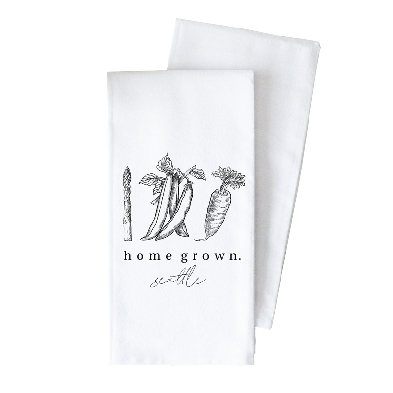 a white dish towel with the words home grown on it