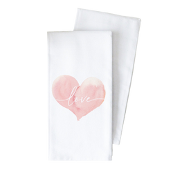two tea towels with the word love painted on them