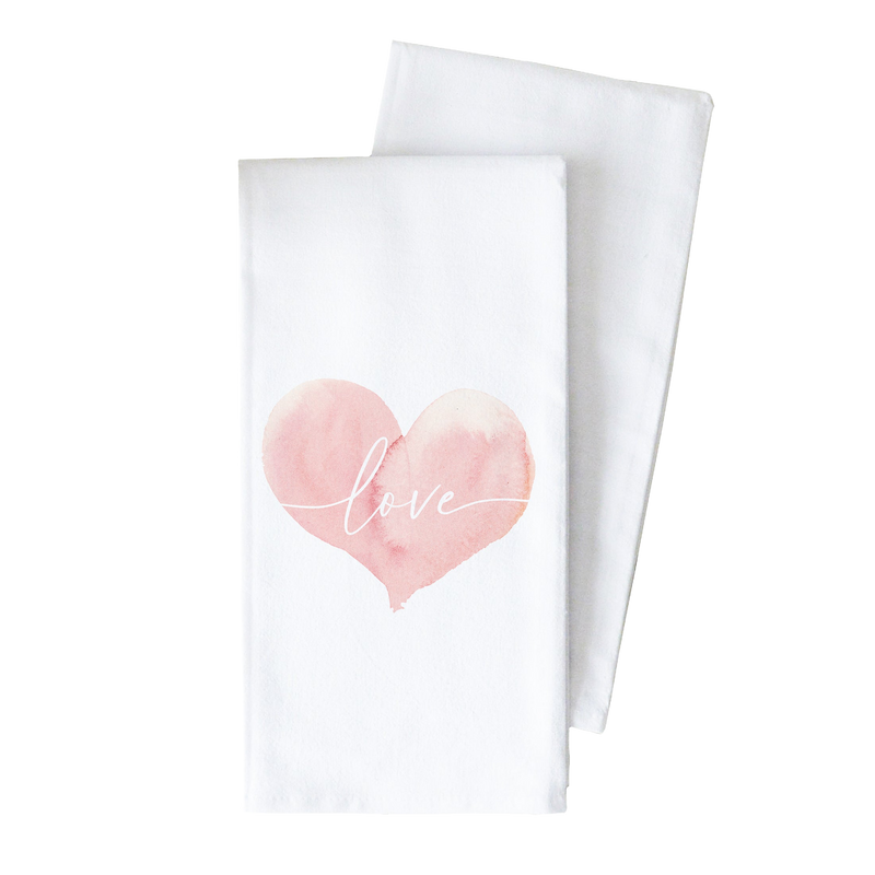 two tea towels with the word love painted on them