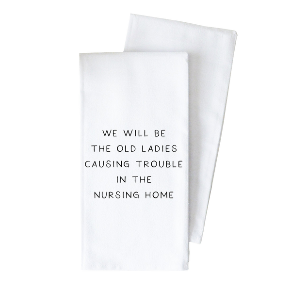 two white tea towels with a quote on them