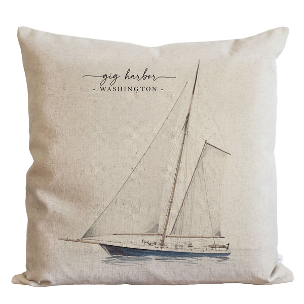 a pillow with a sailboat drawn on it