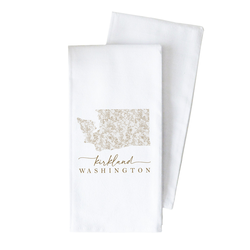 a white towel with a gold state of washington on it